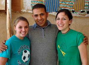 Katie and Chas with Egyptian boy. Photo by Ferrell Jenkins.
