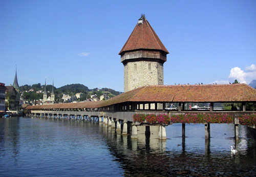 Lucerne, Switzerland. Chapel Bridge. Photo from Wikimedia Commons.